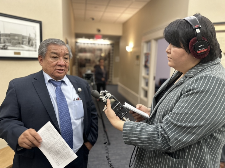 Sen. Benny Shendo (D-Jemez) is interviewed in the New Mexico capitol by former New Mexico Local News Fellow Jeanette DeDios, now working at KUNM public radio. Photo by Gwyneth Doland.